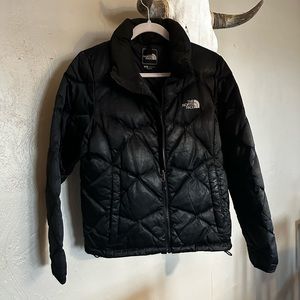 The North Face puffer. Size medium. Color black.
